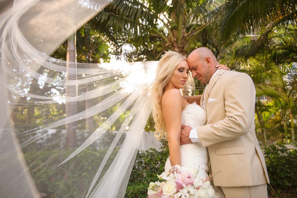 Bride and Groom share romantic moment for their Boca Raton wedding.