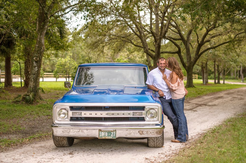 Engaged couple with old truck for Palm Beach photo shoot
