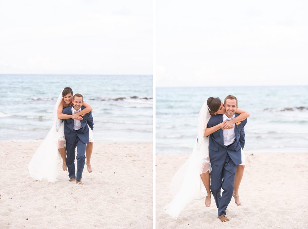 Fun beach photo of bride and groom at their Palm Beach Wedding